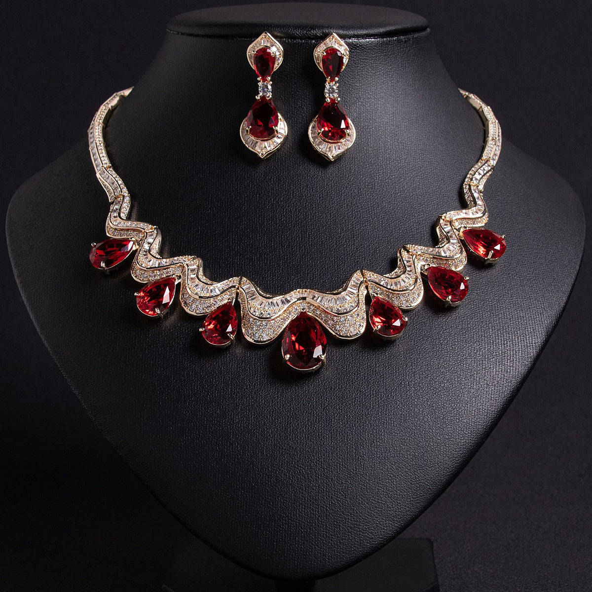Yasmin wave teardrop bridal set, gold with ruby-red stones