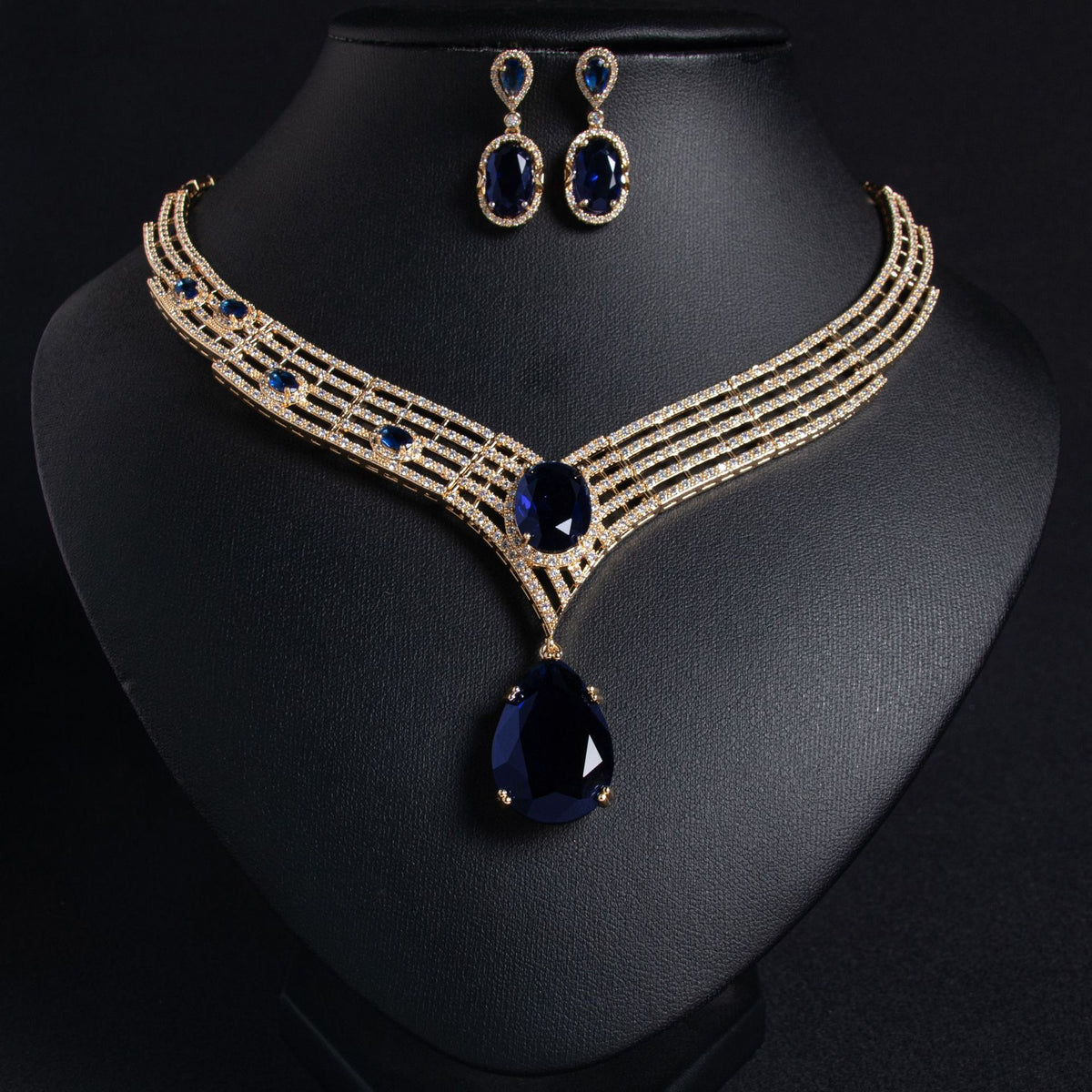 Lina teardrop bridal necklace and earrings, gold with sapphire-blue stone