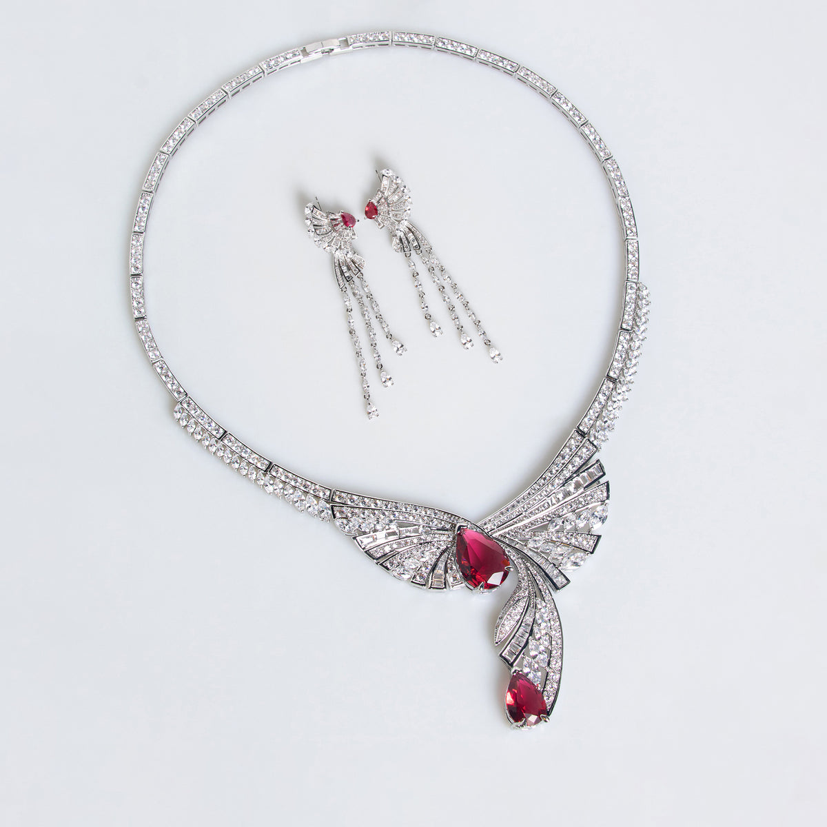 Rania wing tassel bridal necklace and earrings laid flat