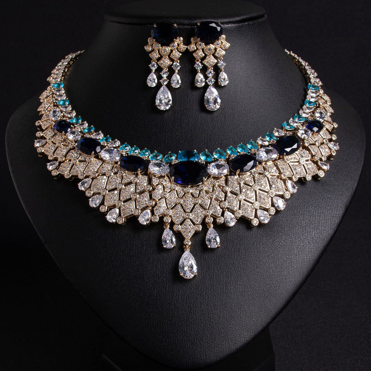 Amira bridal necklace and earrings set, gold with sapphire-blue stones