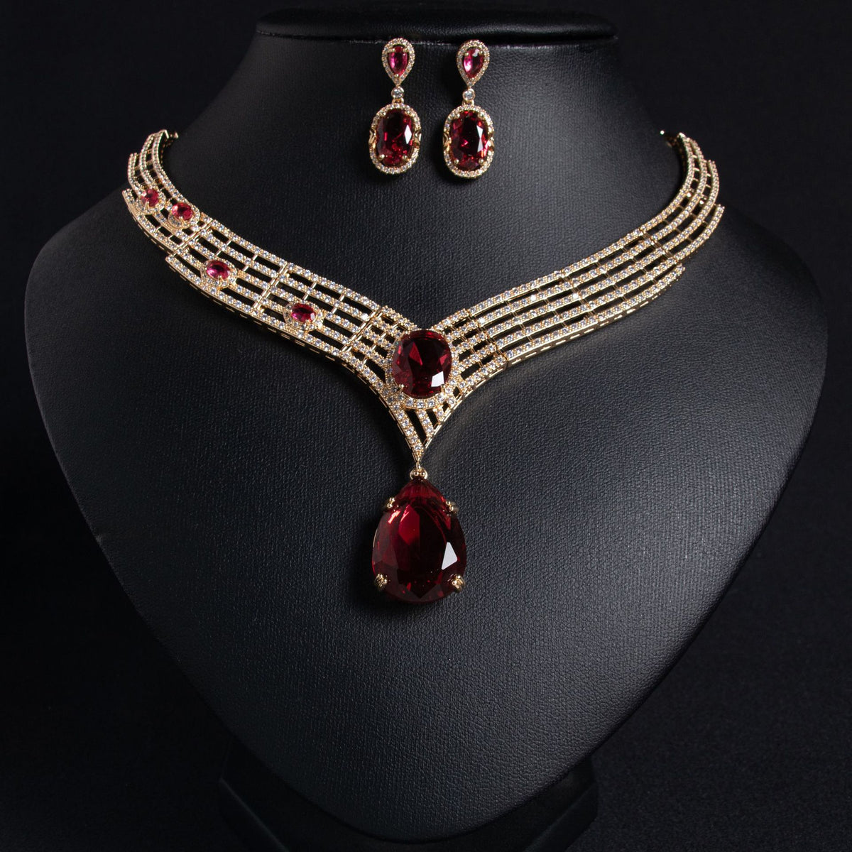 Lina teardrop bridal necklace and earrings, gold with ruby-red stone