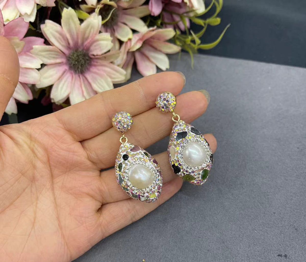 Baroque pearl statement ring worn on hand