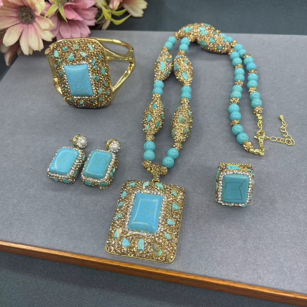 Turquoise necklace, earrings and ring set close-up